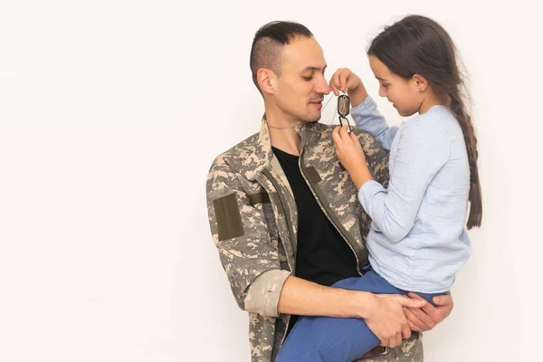 Affectionate Girl Looking Camera Out Her Father Back Camouflage — Stock Photo, Image