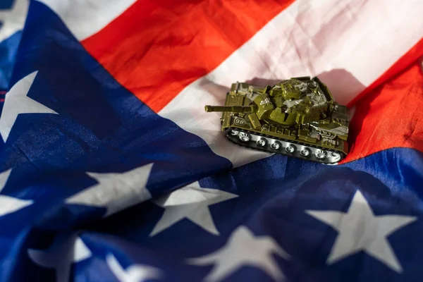 stock image Toy tank with USA flag on green background. High quality photo