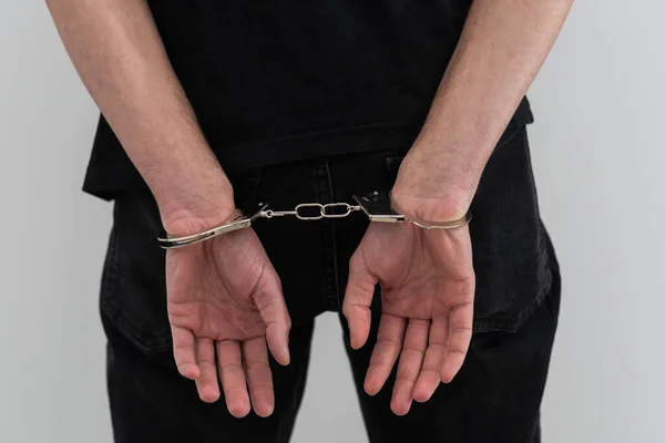 Arrested Man Cuffed Hands Prison Bars — Stock Photo, Image