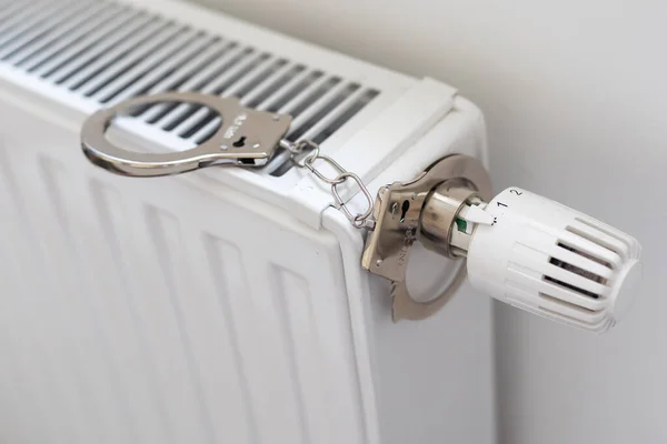 Handcuffs Hanging Radiator White Wall Indoors High Quality Photo — Stock Photo, Image