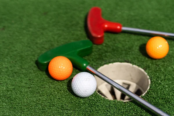 Mini Golf Clubs Balls Different Colors Laid Artificial Grass — Fotografia de Stock