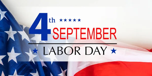 waving American flag with typography Labor Day, September 7th, United state of America, American Labor day design. Beautiful USA flag Composition. Labor Day poster design. High quality photo
