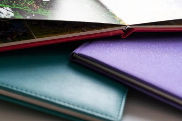 Stack of notebooks with color leather cover. High quality photo