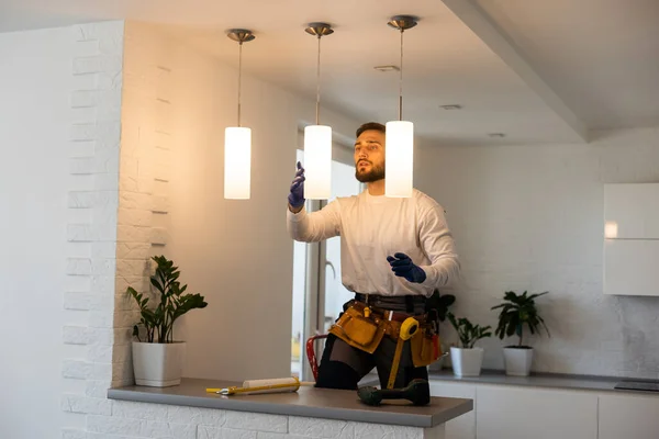 Electrician Mounting Ceiling Lamp Installing Wires — 스톡 사진