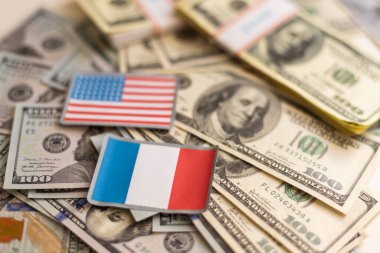 us and france flags with euro and dollar banknotes mixed image. High quality photo