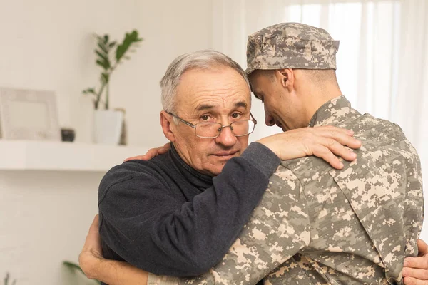 an elderly father and a military son.