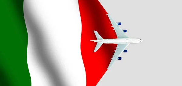 The flag of Italy and the plane. Toy plane on the Italian flag. Concept of a travel.