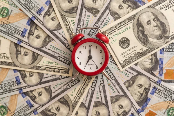 Money and time come together in a vertical format for various conceptual themes. High quality photo