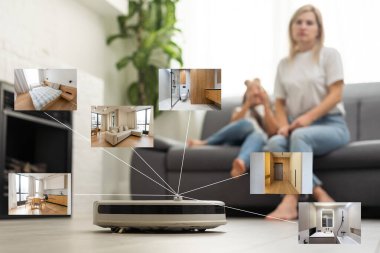 İnsanlar, ev işleri ve teknoloji konsepti. Robot elektrik süpürgesi