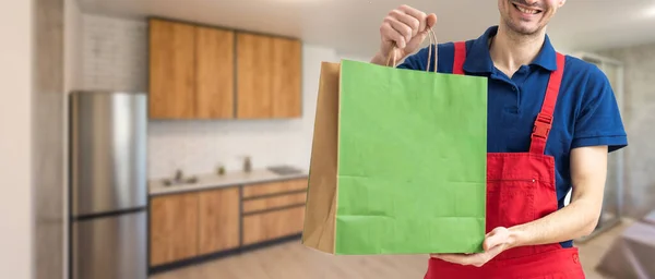Young Handsome Man Holding Delivery Paper Bag — Stock Photo, Image
