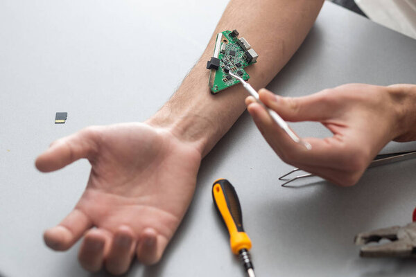 Human robotic hand in futuristic concept.