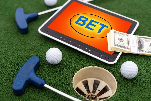 Money, golf club and mobile phone on color background. Concept of sports bet. High quality photo