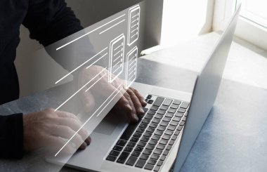 Online documentation database and document management system concept. Businesswoman working on laptop with virtual screen. Process automation to efficiently manage files.