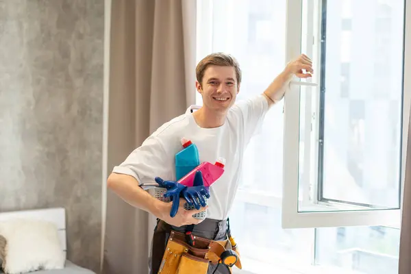 Side View Smiling Man Bottle Detergent Rag Cleaning Window Home — Stock Photo, Image