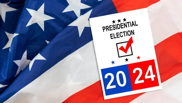 Politics and voting concept. Presidential election 2024 text on white paper over the American flag background. High quality photo