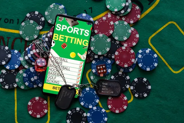 Army tokens, smartphone with sports betting.