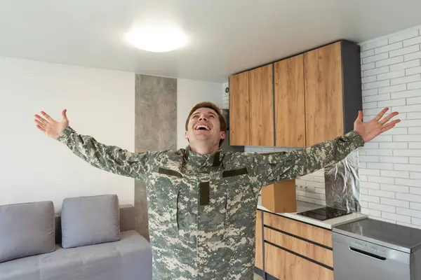 military man in new apartments.