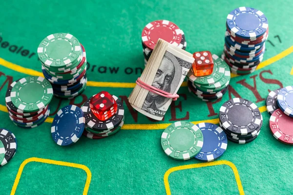 Close-up of poker chips and dollars on a green poker table.Poker concept. winning concept. High quality photo