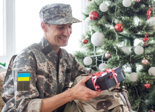 Ukrainian military man with a guitar.