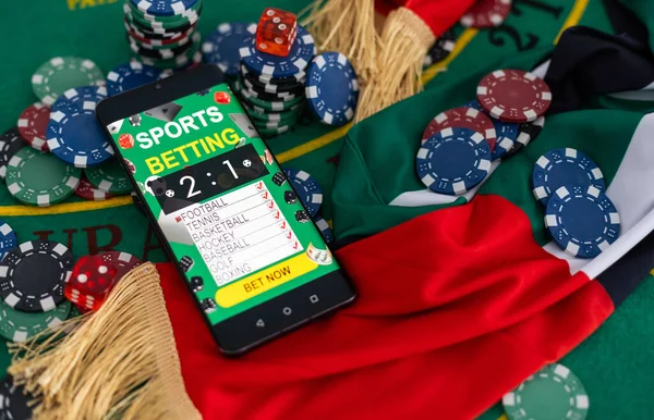 Gambling online casino Internet betting concept green screen. smartphone with poker chips, dice. Jackpot, casino chips. High quality photo