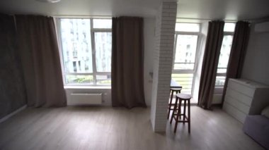 Modern oturma odası ve mutfak küçük daire.