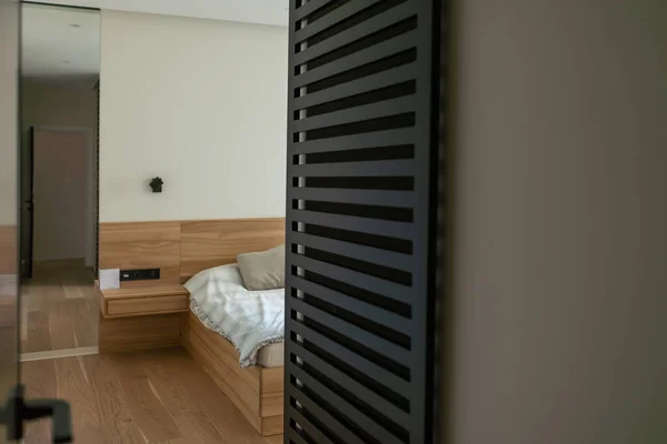 Hotel interior room, Condominium or apartment doorway with open door in front of blur bedroom background