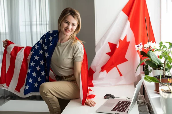 woman with laptop and usa flag. Foreign languages learning, educational online course. High quality photo