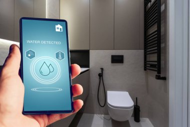 Su saptanmış ev kontrol uygulamalı akıllı telefon.