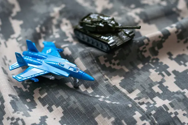 Miniature model of military tanks. Russian War of Ukraine War Concept. High quality photo