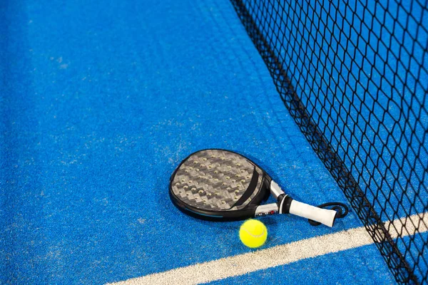 paddle sport on the paddle court, ball, rackets. High quality photo
