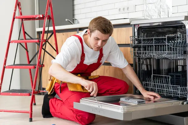 Repairman Checks Operating State Dishwasher Kitchen — Stock Photo, Image