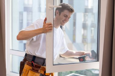 a repairman repairs, adjusts or installs metal-plastic windows in the apartment. glazing of balconies, loggias, verandas in house. production of double-glazed windows to individual sizes. clipart