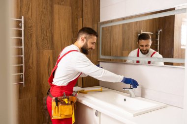 plumber service. wash basin installation.