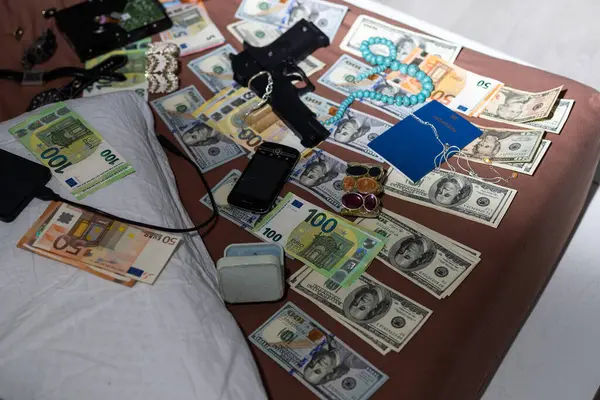 Checking counterfeit money with an ultraviolet lamp. Polish zloty. High quality photo