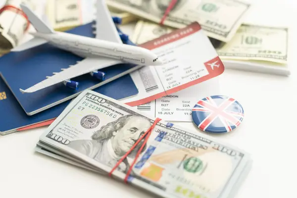 Plane on dollar cash background, travel with airplane concept. High quality photo