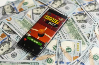 Spor bahisleri, akıllı telefonlar, online bahis uygulamaları. Yüksek kalite fotoğraf