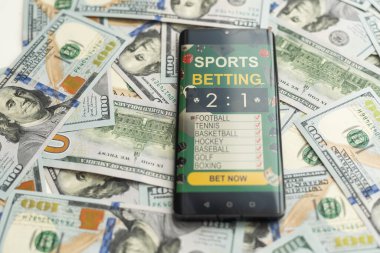 Dolar ve avro, spor bahisleri için akıllı telefon. Yüksek kalite fotoğraf