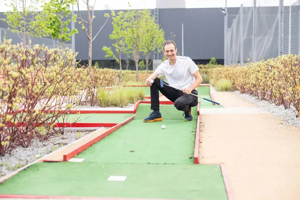 stock image Minigolf player detail on green grass. High quality photo