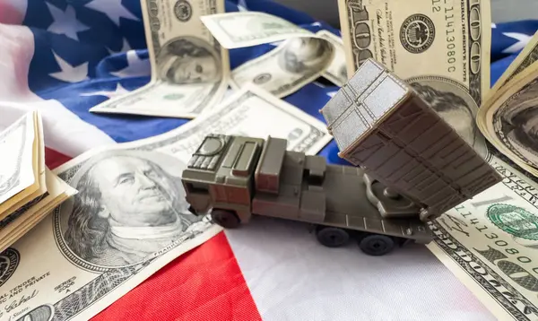 stock image toy military vehicle and usa flag, money. High quality photo