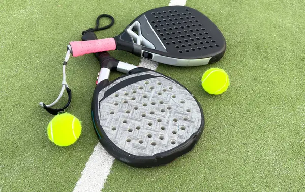 stock image  paddle rackets on the playing court. High quality photo