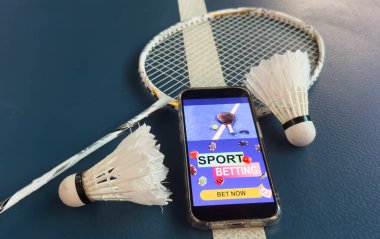 Sports betting on badminton. badminton racket. Mobile app for bets. High quality photo clipart