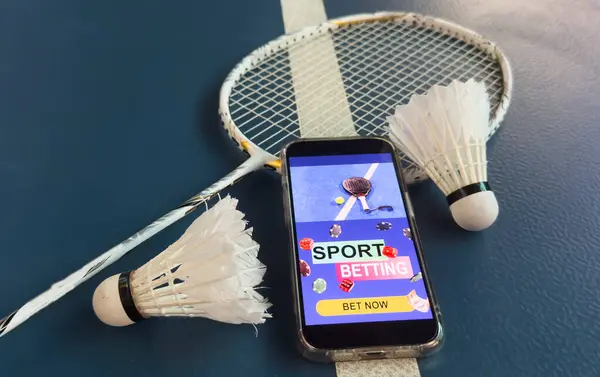 stock image Sports betting on badminton. badminton racket. Mobile app for bets. High quality photo