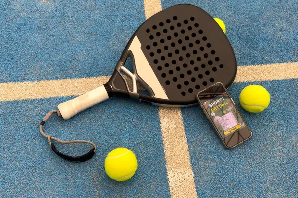 stock image  padel tennis racket and smartphone with betting. High quality photo