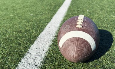Pro American Football on the Field Close Up with Yard Çizgileri Ötesinde. Yüksek kalite fotoğraf