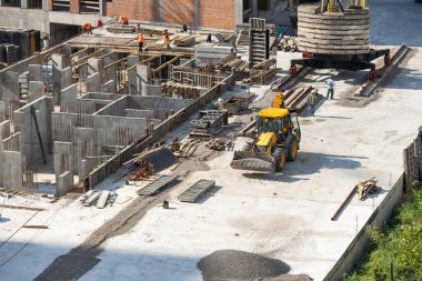 Top view of construction site during concreting of basement stairs. High quality photo clipart