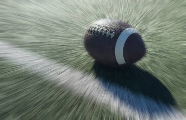 Bir çim tarlasında bir Amerikan futbol topu var. Yüksek kalite fotoğraf