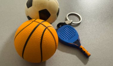 keychain with a tennis racket. High quality photo clipart