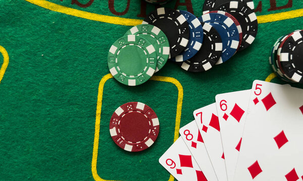 Poker cards with combination. The winning combination in a game in a poker club. The concept of luck in the poker game. High quality photo