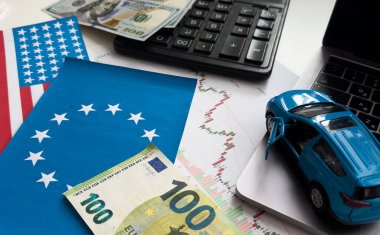 Birleşik Devletler ve Avrupa Birliği bayrakları, dolar ve çizelgeler. Yüksek kalite fotoğraf