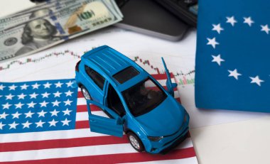 Birleşik Devletler ve Avrupa Birliği bayrakları, dolar ve çizelgeler. Yüksek kalite fotoğraf